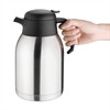 A hand holding Olympian Vacuum Jug.