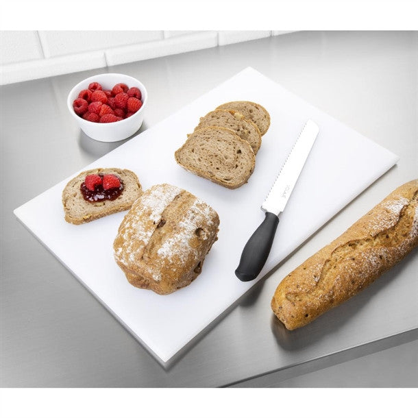 Full shot of White colour High Density Chopping Board with strawberry jam and sliced bread and knife.
