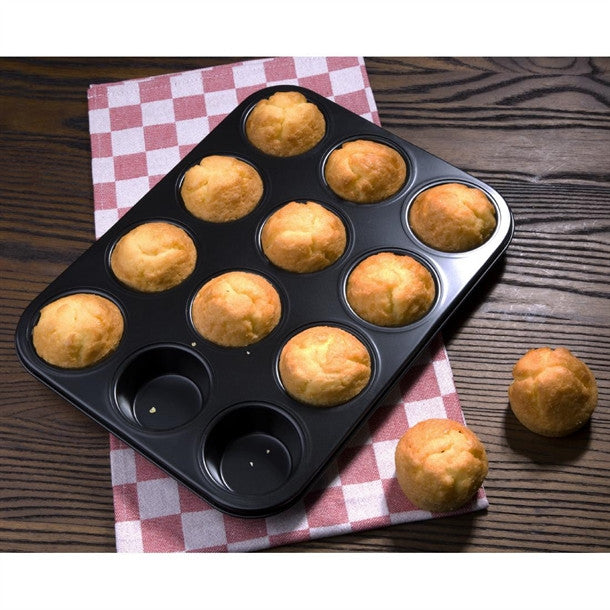 Full shot of  Vogue Non Stick Muffin tray 12 cup with cooked muffins.
