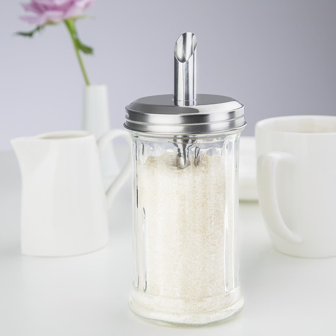 Olympia Sugar Pourer With 19mm Single Spout table set up.