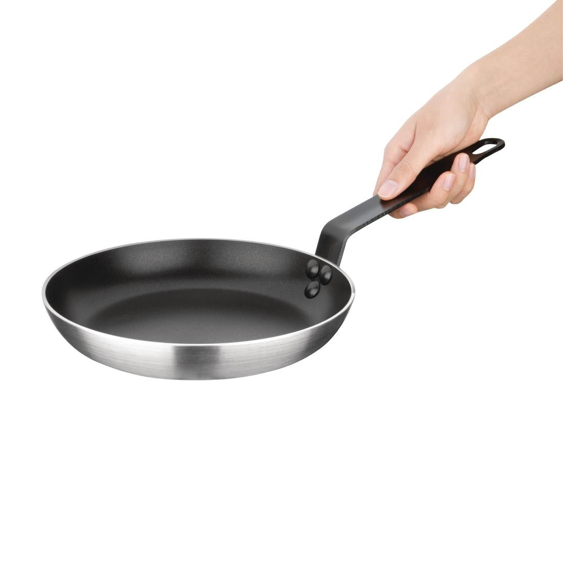 Hand holding Essentials Non-Stick Teflon Frying Pan 240mm.