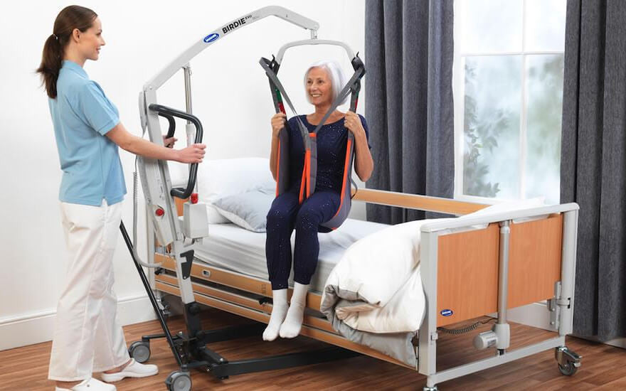 Invacare Birdie Evo Compact Hoist in action