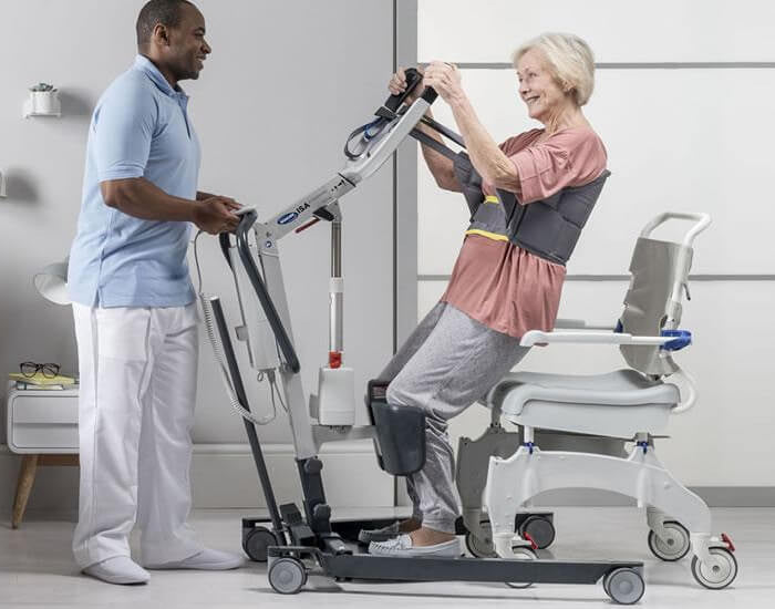 Front of Invacare ISA Compact Stand Assist in action