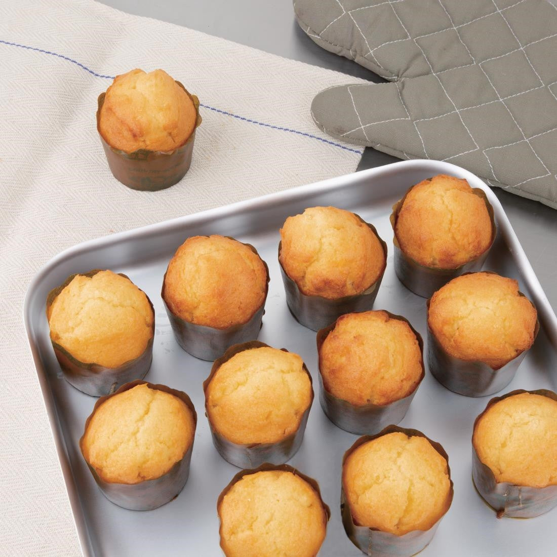 Vogue Aluminium Bakewell Pan 420mm with baked muffins.