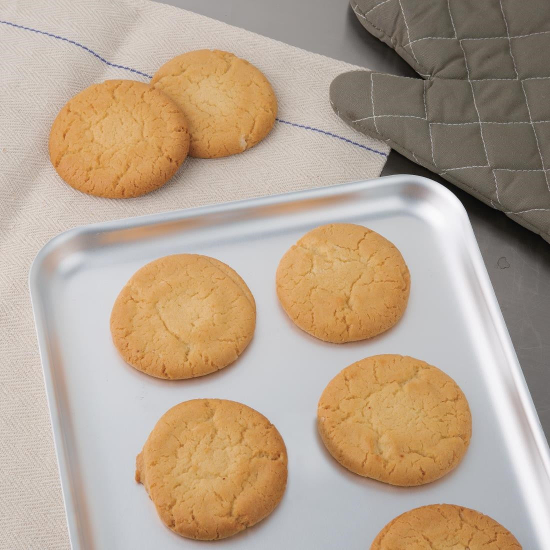 Vogue Aluminium Baking Tray 370 x 265mm with baked cookies.