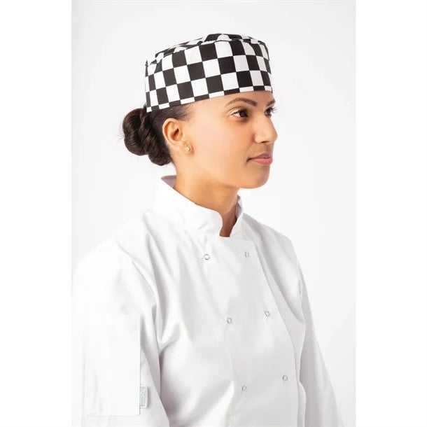 Chef wearing Whites Chefs Skull Cap Big Black and White Check