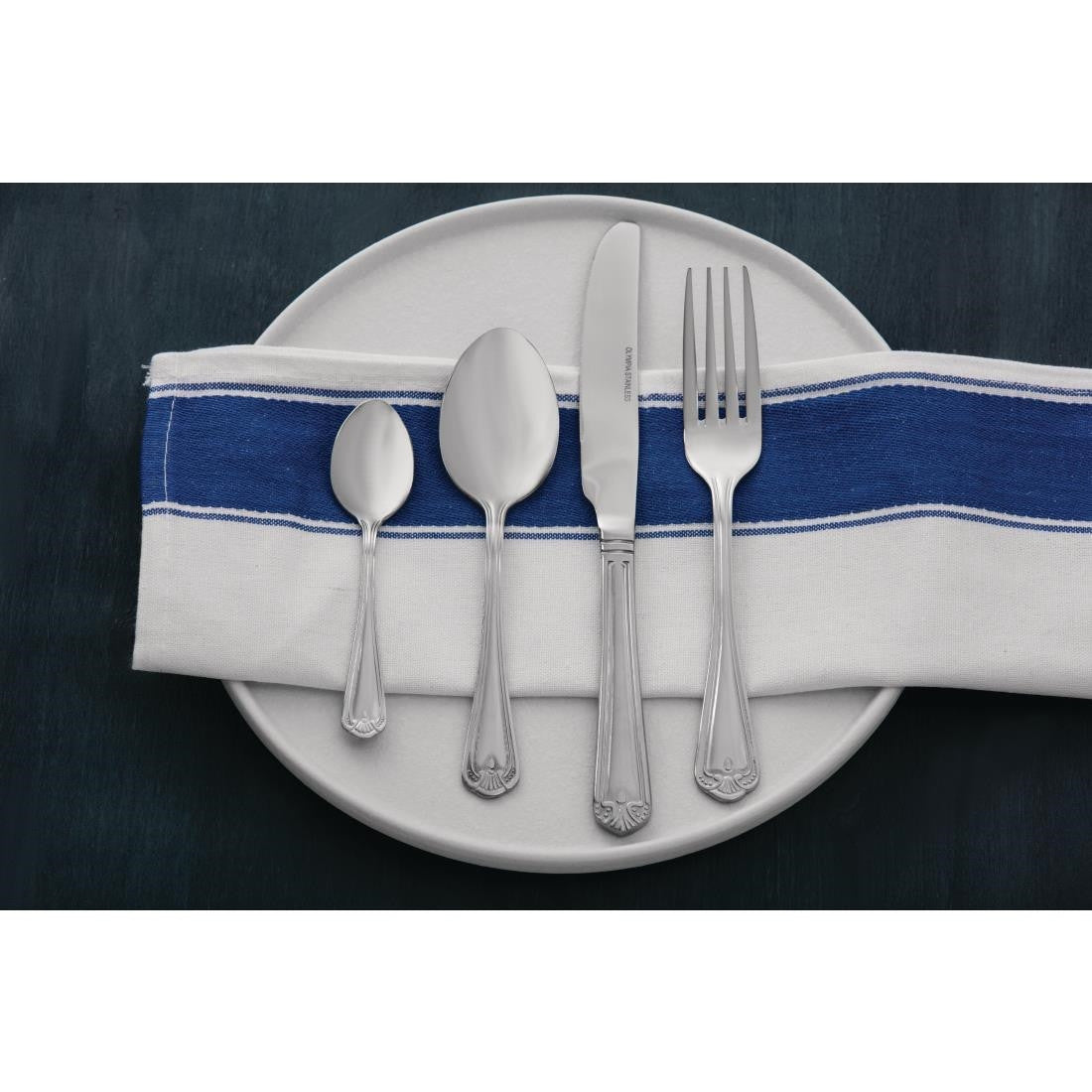 Table set up of Olympia Jesmond Teaspoon with other cutleries.