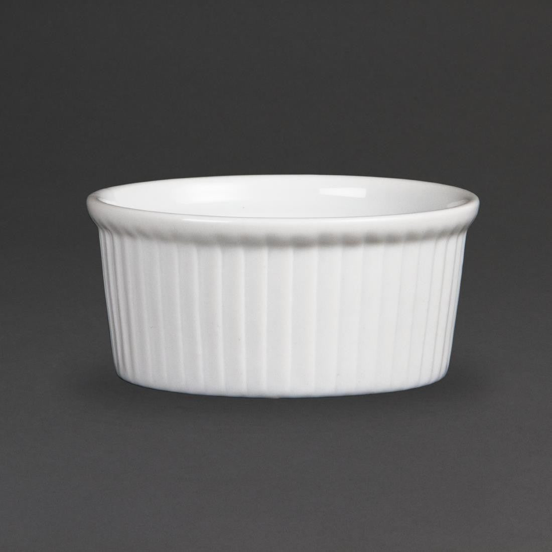 Olympia Whiteware Ramekins 85mm in a black background.