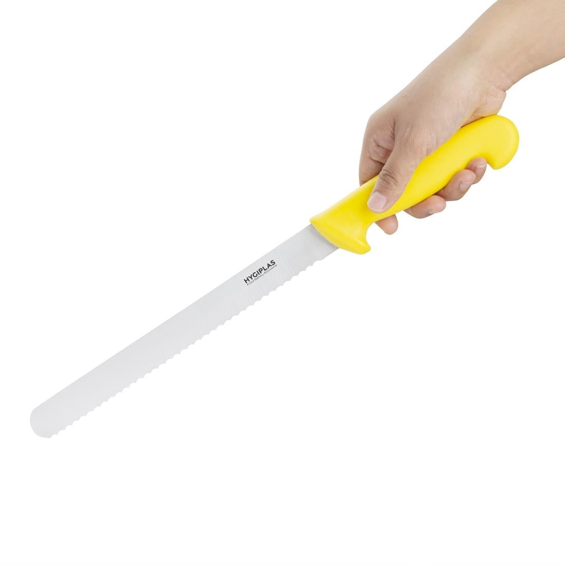 Hand holding Hygiplas Serrated Slicer Yellow 25.5cm.