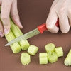 A person cutting something using Hygiplass Paring Knife Red colour 3 inch.