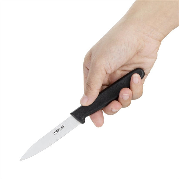 A hand holding  Hygiplass Black Paring Knife 3 inch.