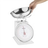 Side shot of Weighstation Kitchen Scales with hand holding it.