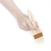 A hand holding a Pastry Brush.