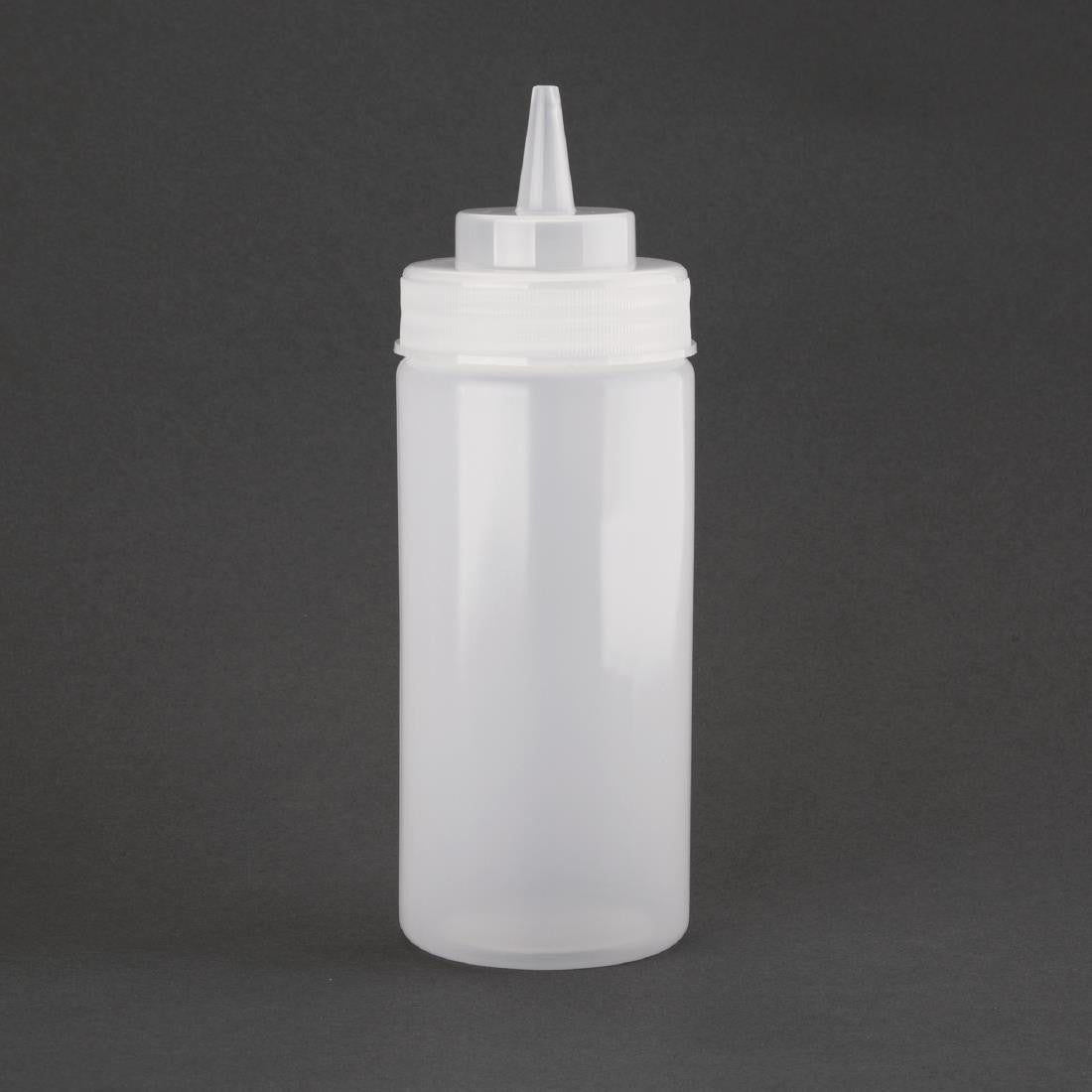 Empty Vogue Clear Wide Neck Squeeze Sauce Bottle 16oz in black background.
