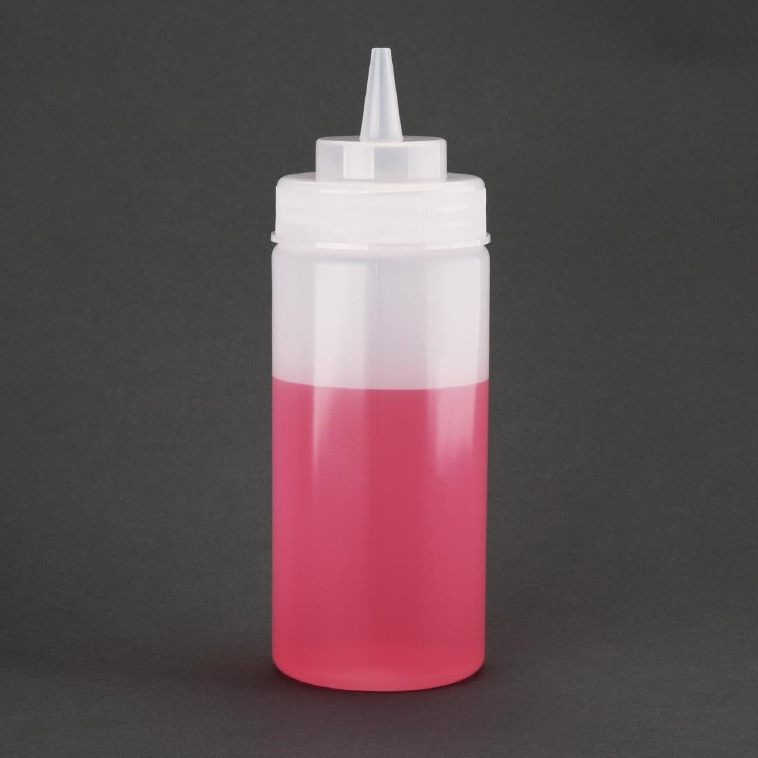 Vogue Clear Wide Neck Squeeze Sauce Bottle 16oz. with content.