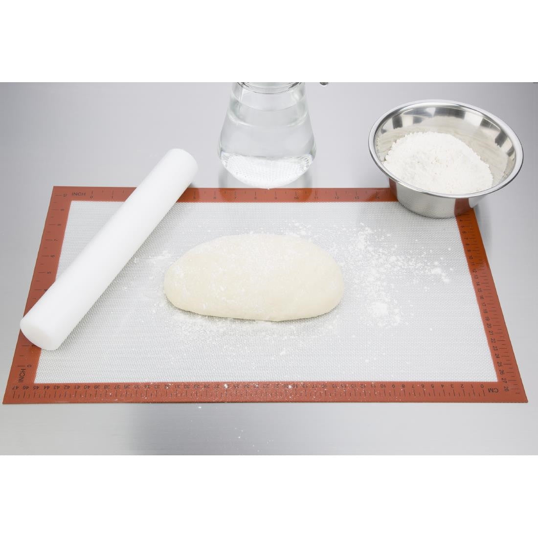 Dough on Vogue Non-Stick Silicone Baking Mat 520 x 315mm with roller and flour.