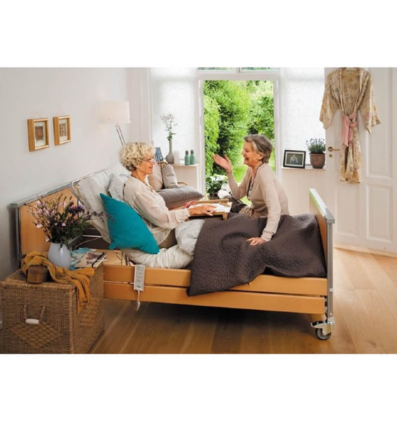Invacare Medley Ergo Profiling Bed in use