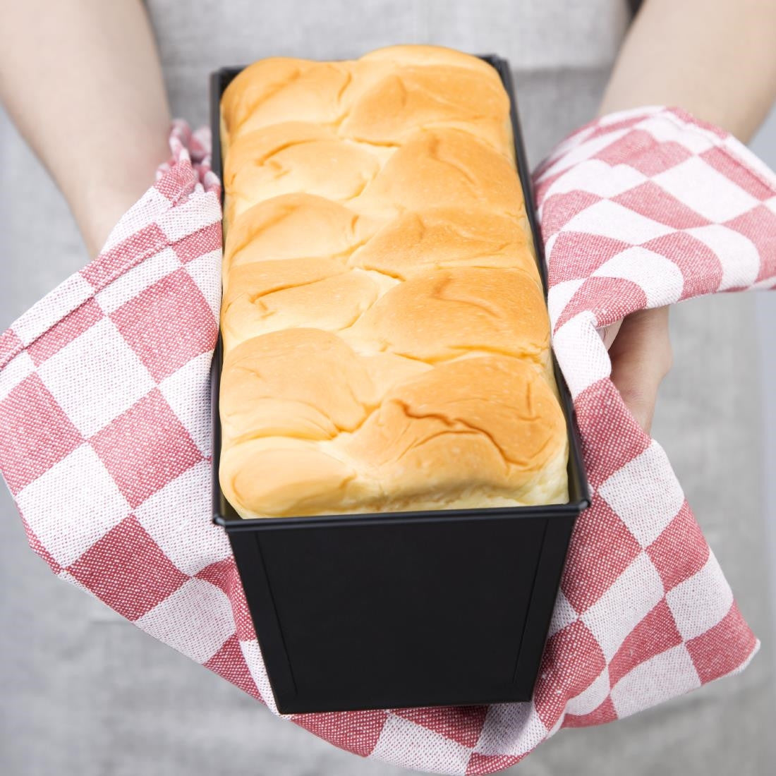 Vogue Non-Stick Loaf Tin 300mm used to baked bread.