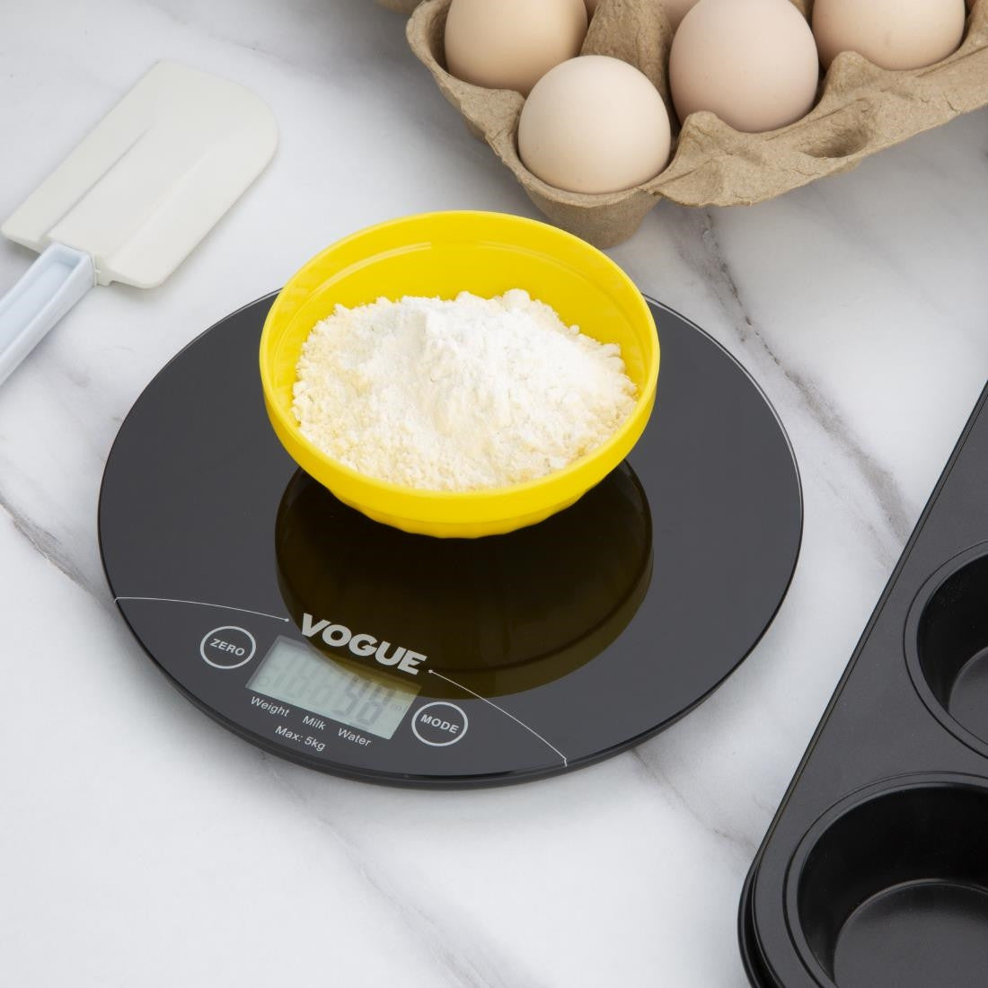 Vogue Electronic Round Scales 5kg used in measuring ingredients.