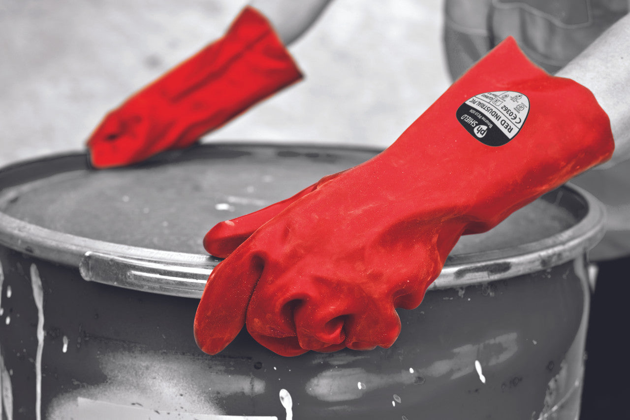 Side shot of a person using Red Gauntlet Gloves.
