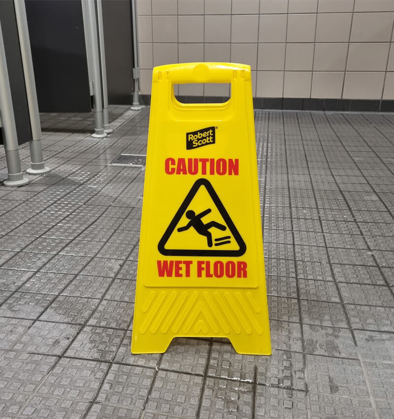 Cleaning in Progress Wet Floor Sign in use
