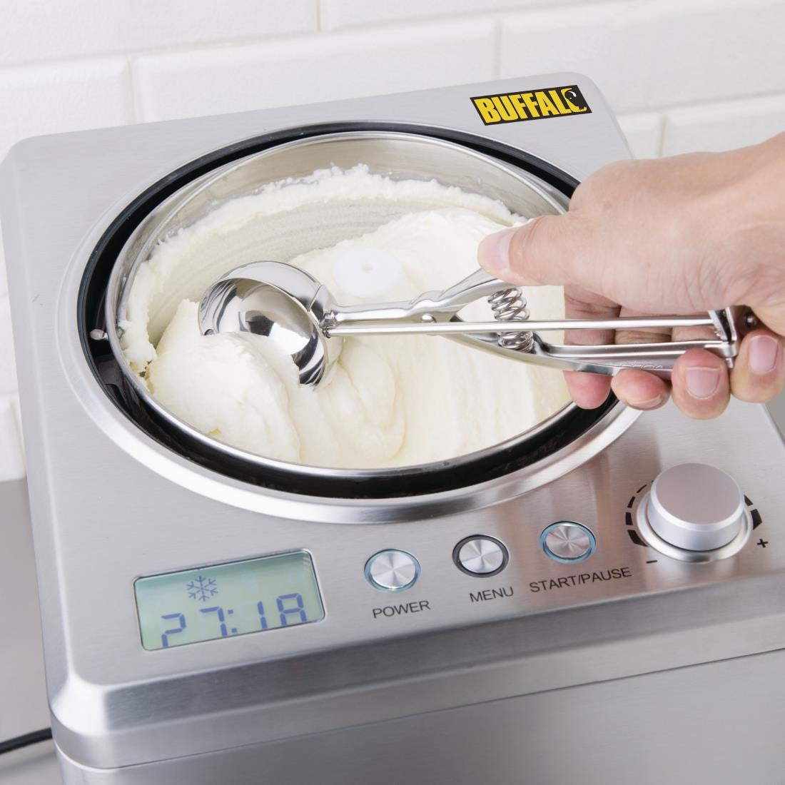 Vogue Stainless Steel Portioner Size 16 used to scoop ice cream.