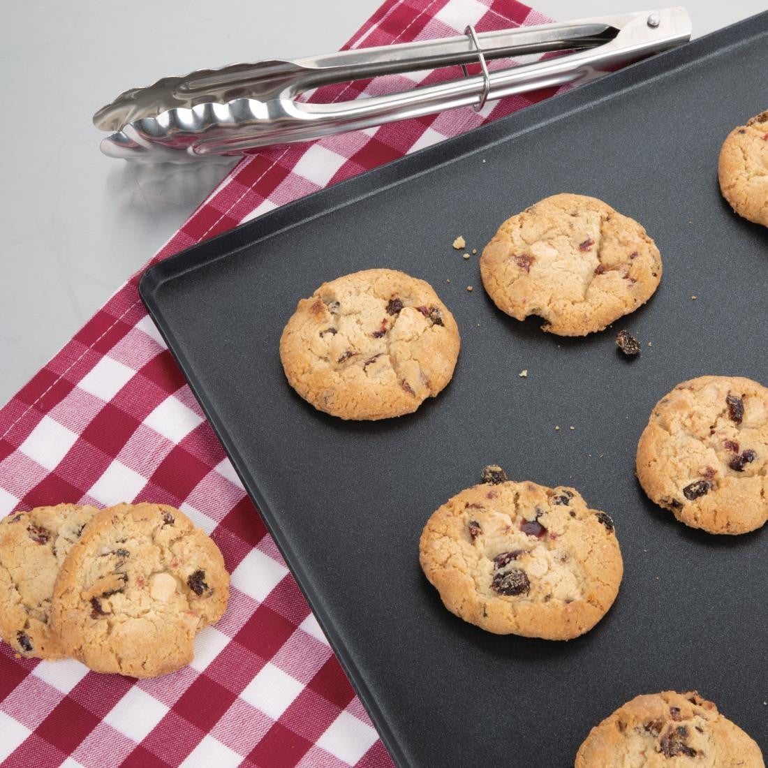 Vogue Non Stick Patisserie Tray with baked cookies.