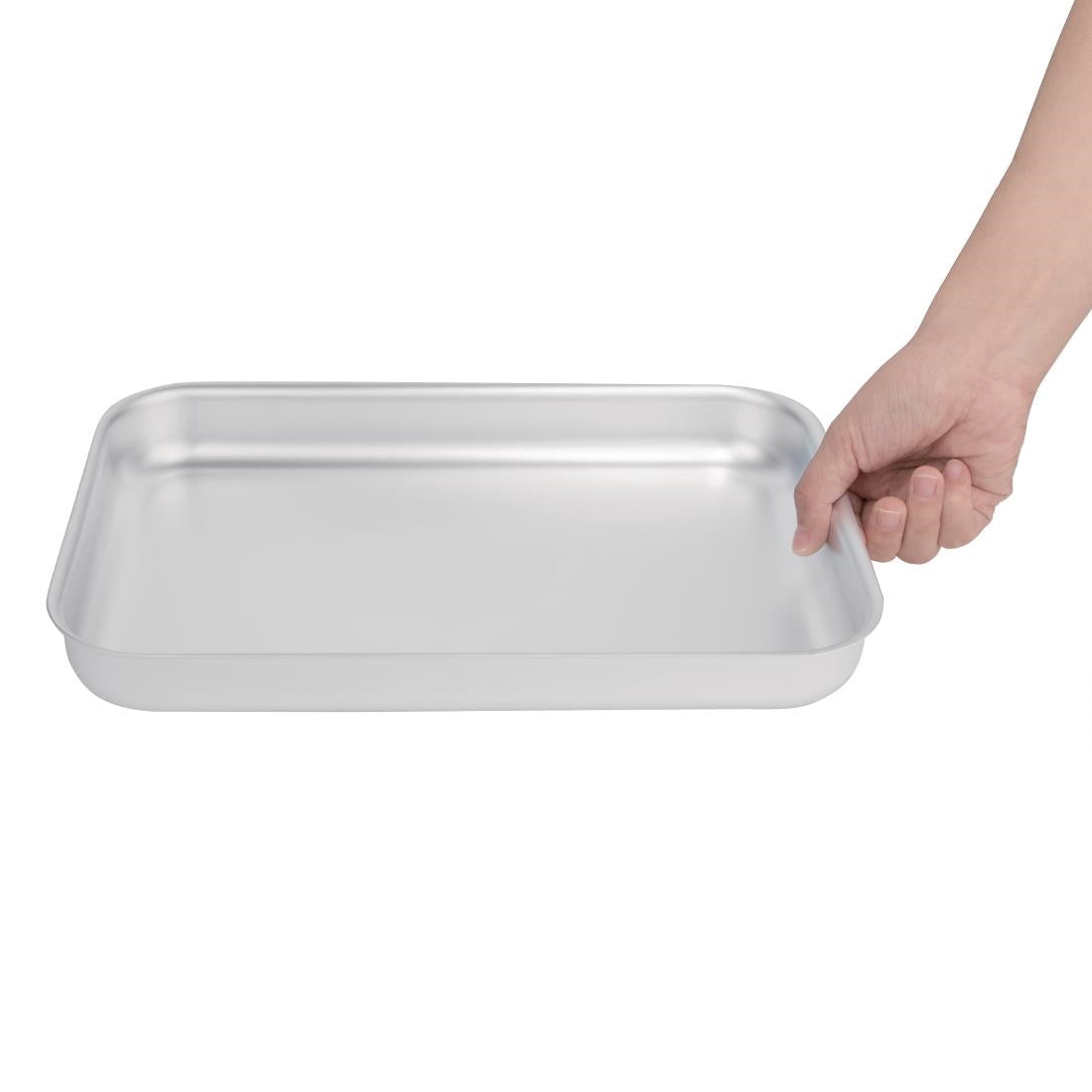 Vogue Aluminium Bakewell Pan 320mm  in hand.