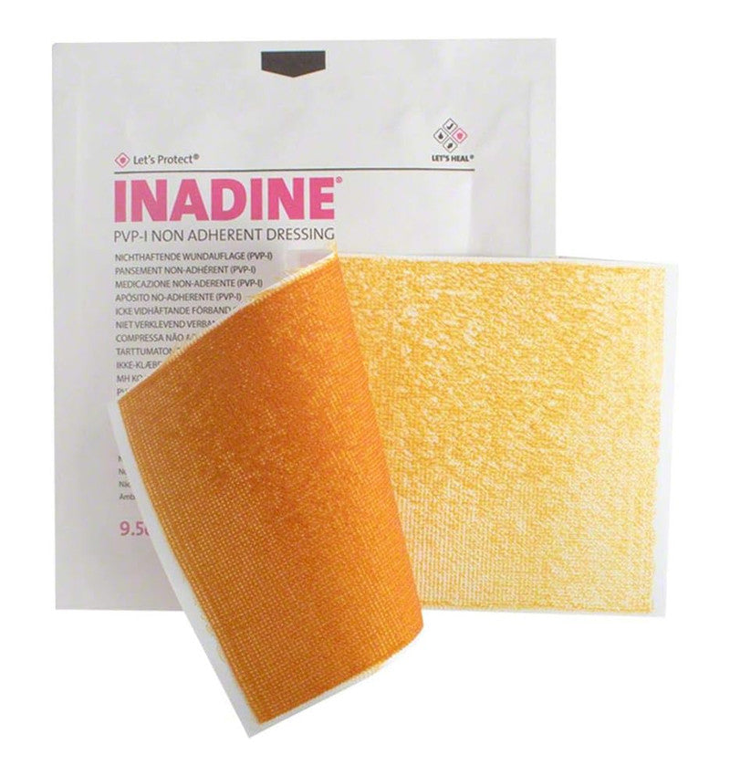 A box and sample of 9.5 x 9.5cm Inadine PVP Dressing pack with dressing