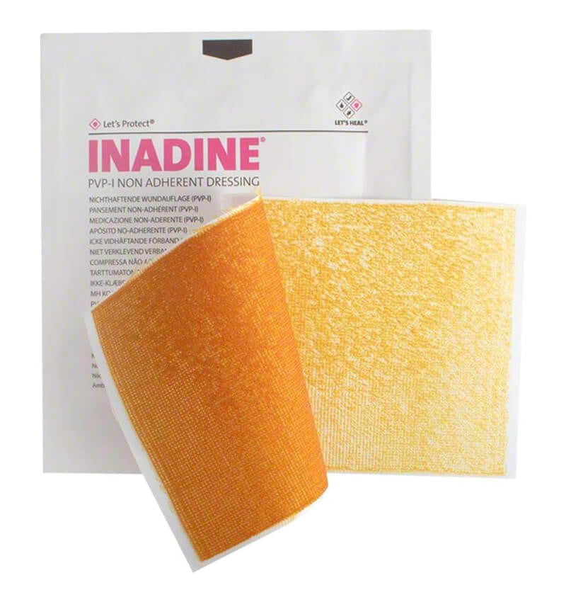 A box and sample of 5 x 5cm Inadine PVP Dressing packet with dressing