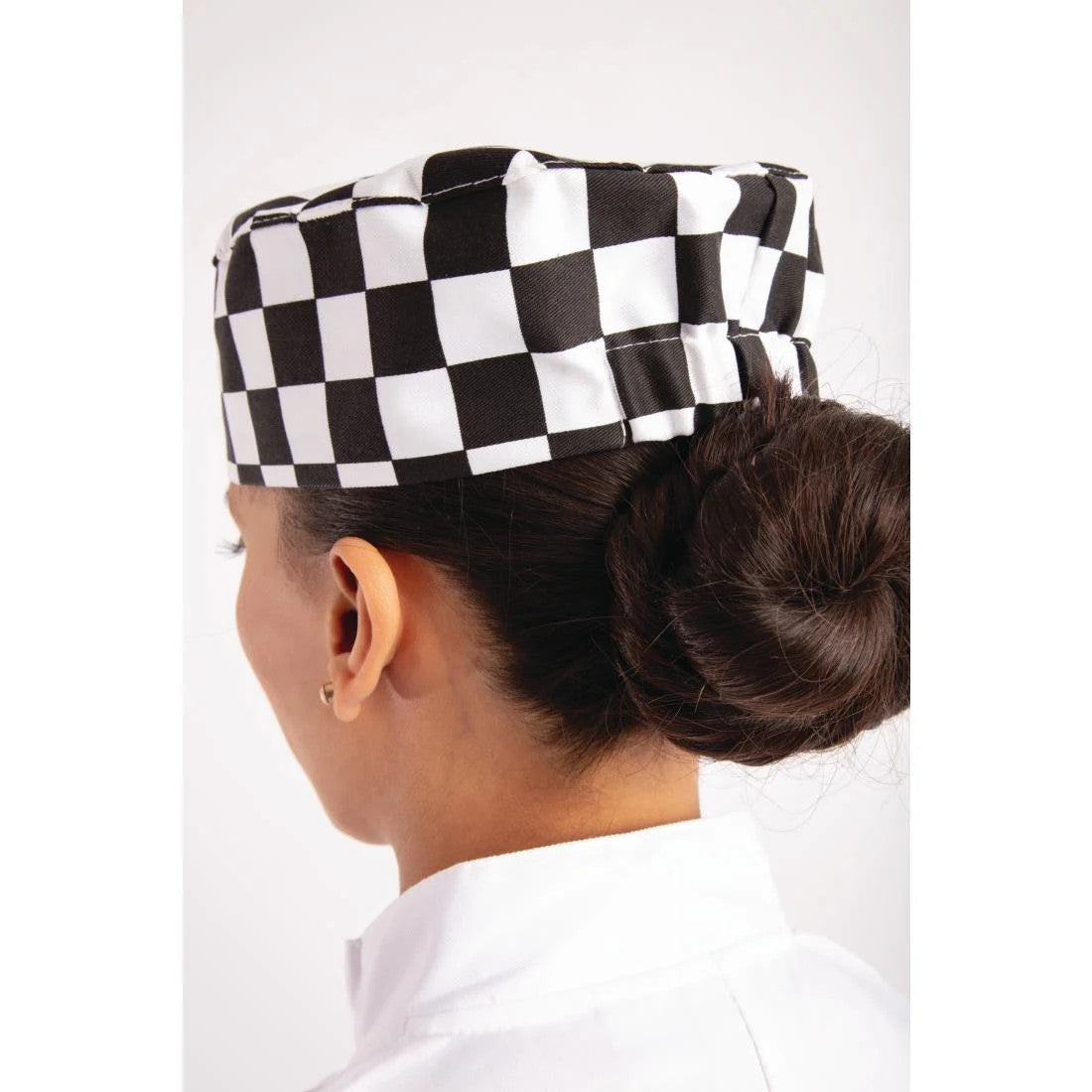 Back of Chef wearing Whites Chefs Skull Cap Big Black and White Check