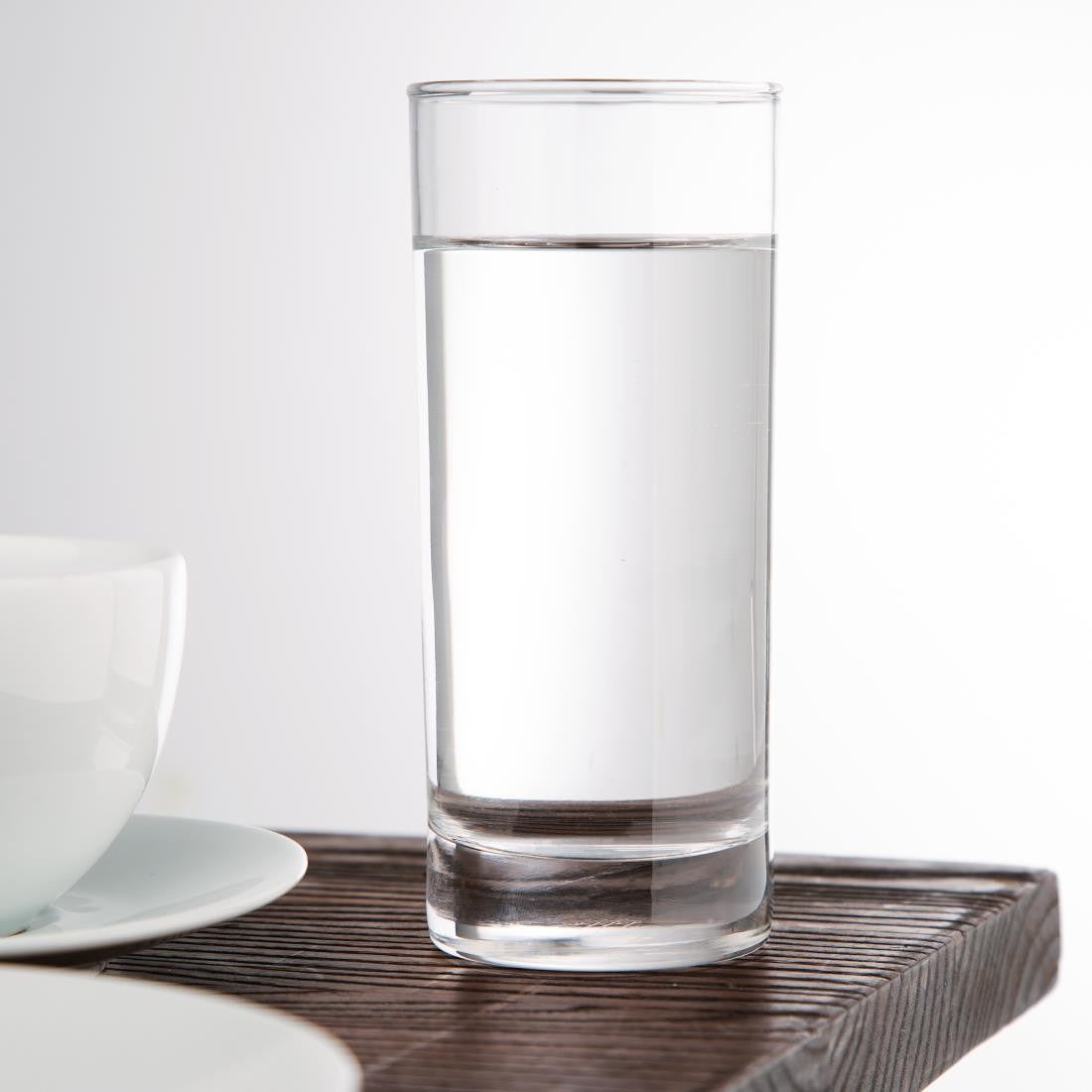 Olympia Hi Ball Glasses 340ml with water on the table.