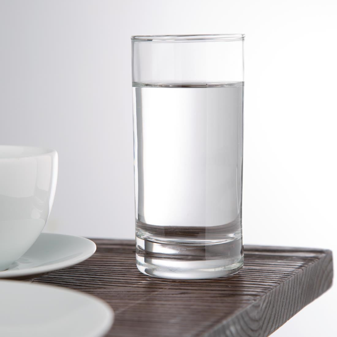 Olympia Hi Ball Glasses 285ml with water placed on the table.