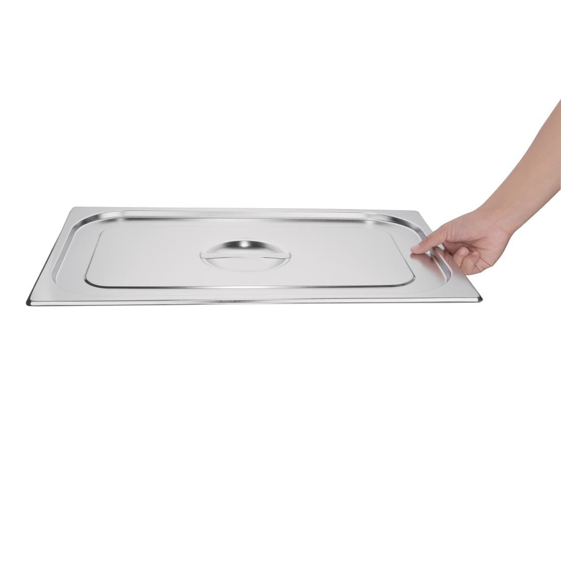 Vogue Stainless Steel 1/1 Gastronorm Lid in hand.