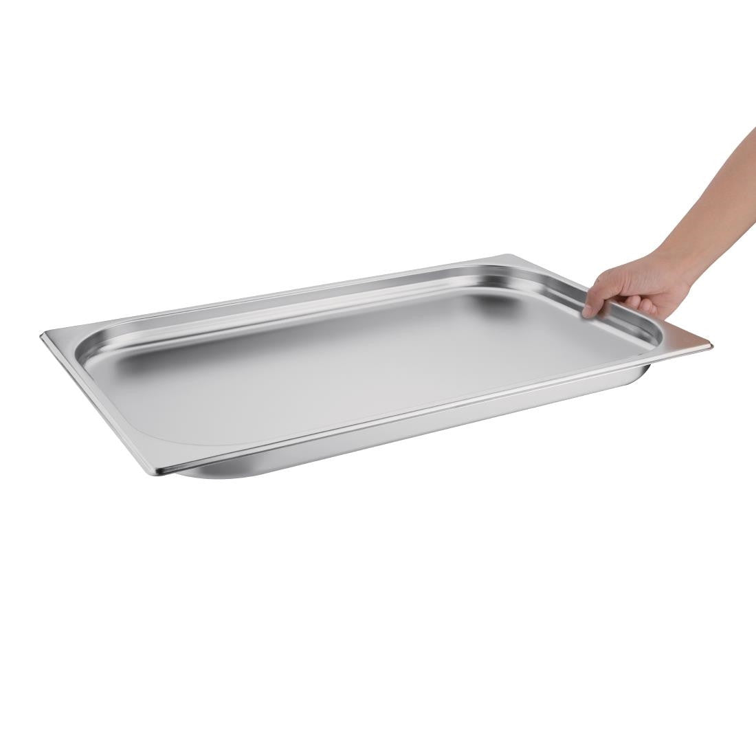 Hand holding Vogue Stainless Steel 1/1 Gastronorm Pan 20mm.